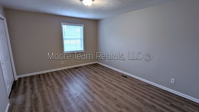 Building Photo - 2 Bed/1.5Ba - Includes - Water, Septic, Trash & Lawn Maint