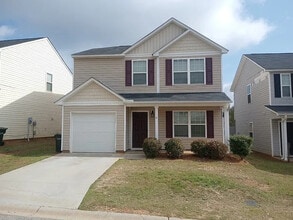 Building Photo - 4 Bedrooms 2.5 Bathrooms