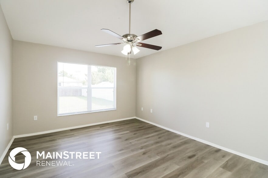 Building Photo - 7465 Jessamine Dr