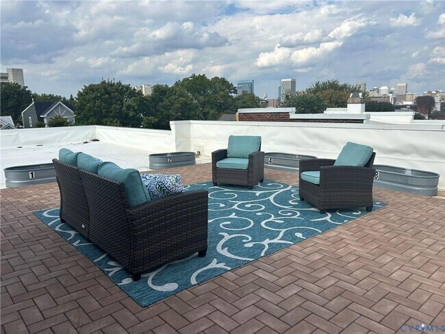 Building Photo - Now Available – Partially Furnished Luxury Condo with Rooftop Terrace | Ideal for Incoming VCU St...