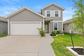 Building Photo - Spacious & Like-New 4-Bedroom Home with Mo...