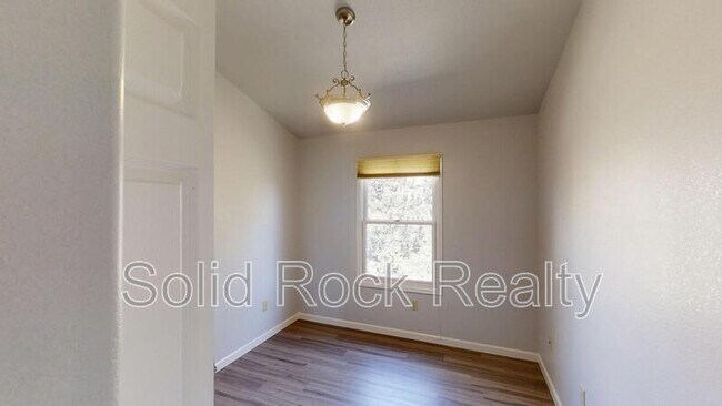 Building Photo - 6945 Yellowpine Dr