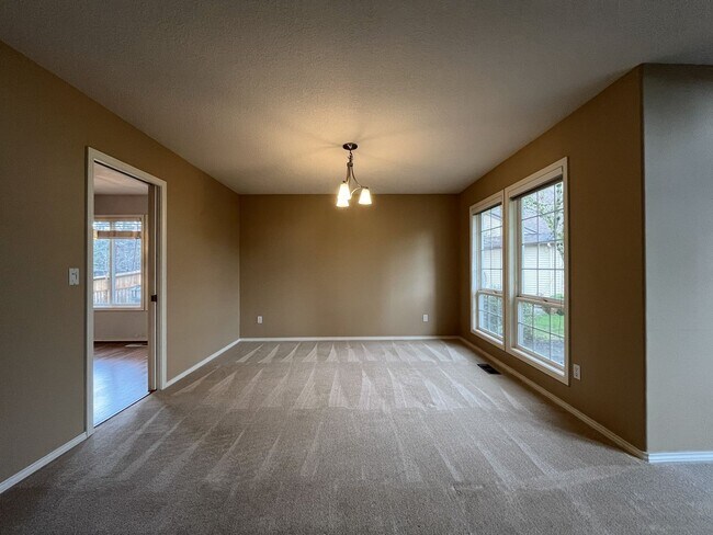 Building Photo - Elegant Home Offering Open Living Spaces, Spacious Primary Suite, and Nature-Inspired Yard