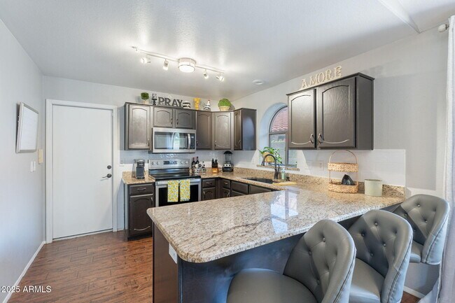 Building Photo - 8846 E Windrose Dr