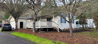 Building Photo - 2 Bedroom Manufactured with 2 Car Garage &...