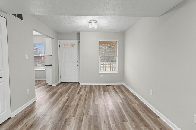 Building Photo - Broad Ripple townhome with garage, updated kitchen, and walkable convenience!