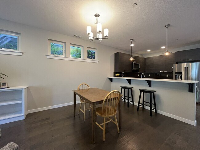 Building Photo - Spacious 2,511 Sq Ft Wilsonville Townhome with Vaulted Loft, Modern Kitchen & Attached Two-Car Ga...