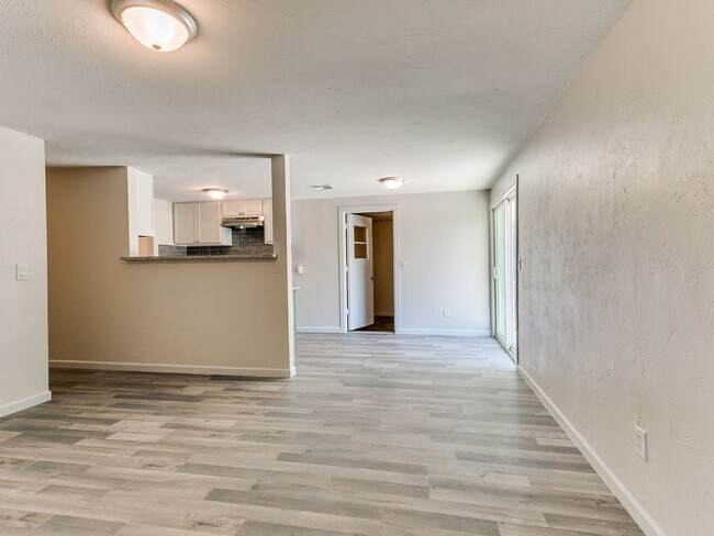 Building Photo - 4 Bedroom/2 Bath home with fenced yard.