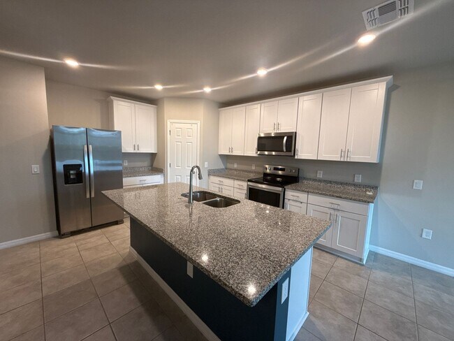 Building Photo - Stunning 4-bedroom, 3-bathroom, 2-stall garage, home. The only thing missing is you.