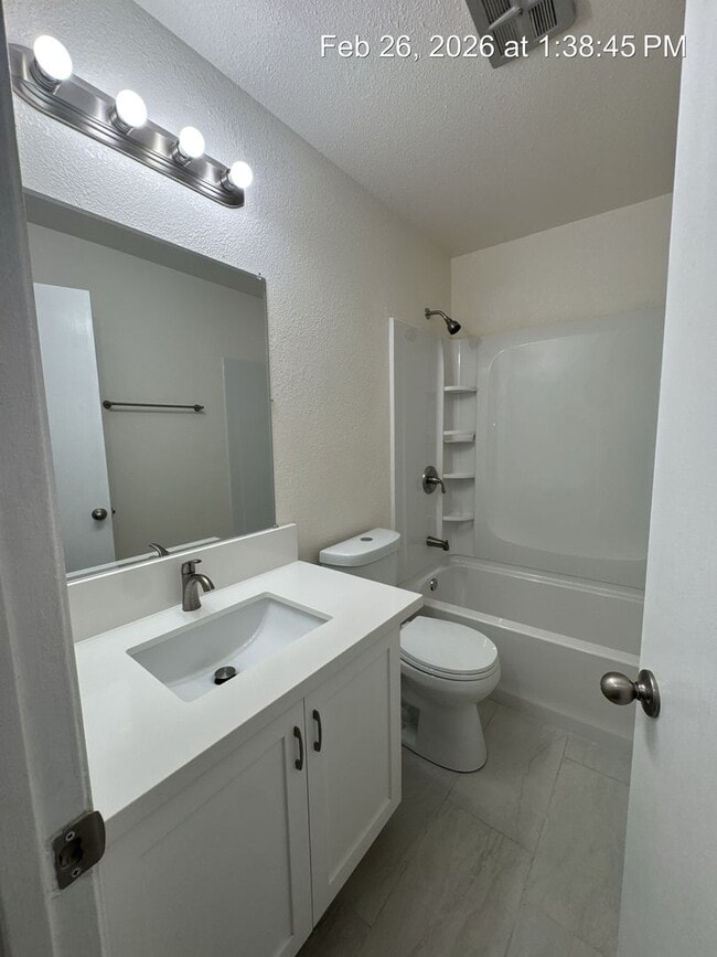 Building Photo - Upstairs unit available now!