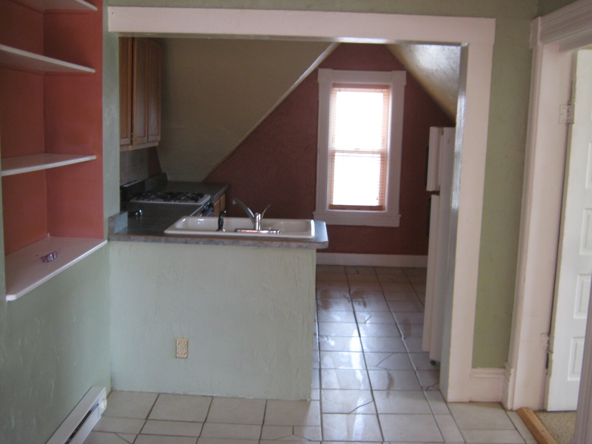 Tiled kitchen floor - 219 Midway Ave. UPSTAIRS