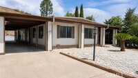 Building Photo - 23057 Big Tee Dr