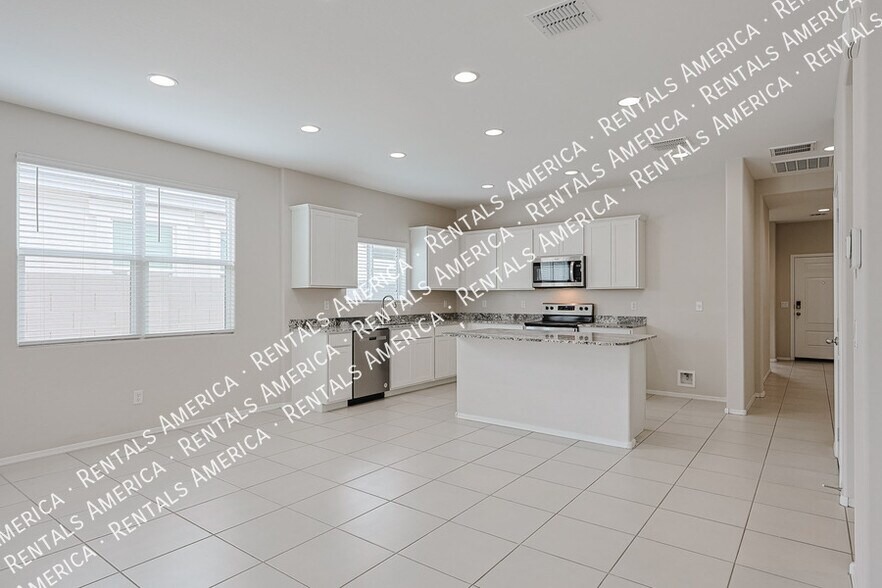 Building Photo - 10338 W Wier Ave