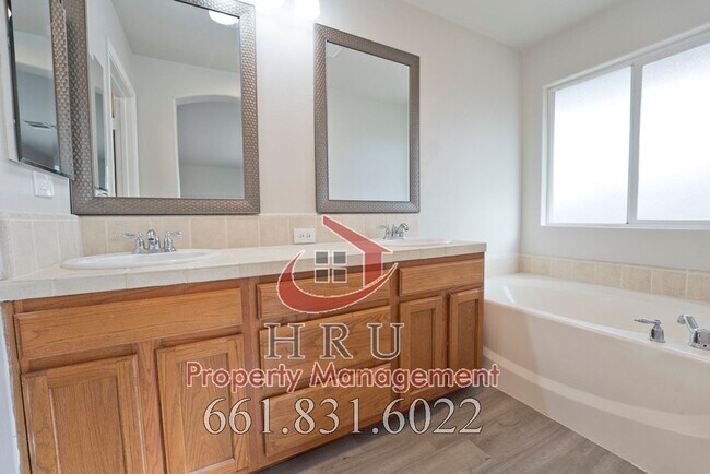 Building Photo - SW-Bakersfield  features 4 bed 2 bath with solar panels