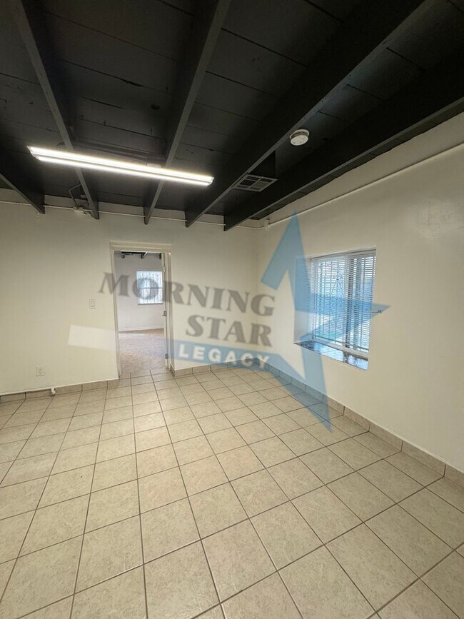 Building Photo - Charming Updated Home w/ Enclosed Yard & Storage