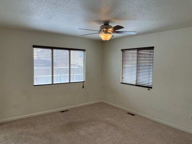 Building Photo - 3 BEDROOM, 2.5 BATHROOM TWINHOME WITH 2 CAR ATTACHED GARAGE