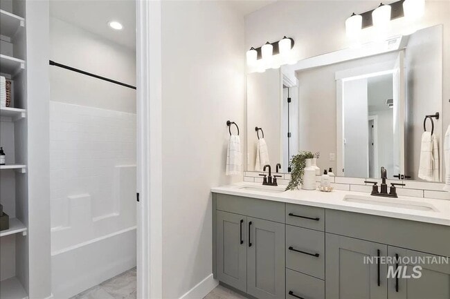 Building Photo - Brand New Spacious 4-Bedroom Home with 3-Car Garage, Granite Kitchen & Prime Middleton Location
