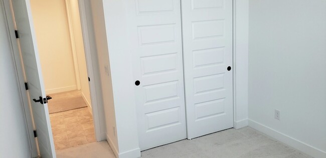 Building Photo - The 2 YEARS NEW 4 bedroom + 3 car garage r...