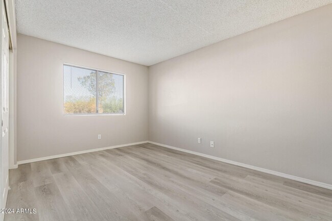 Building Photo - 7144 N 66th Dr