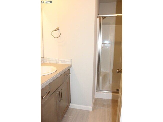 Building Photo - Modern 3-Bedroom Townhome-Style Home with Attached Garage, Private Patio & En-Suite Bathrooms in ...