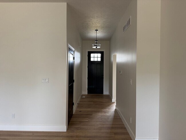 Building Photo - New Construction! West side location. 4br, 3bth, 2crg, Finished basement. All new stainless steel...