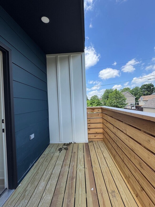 Building Photo - Vaulted Ceilings & Hardwood Floors in This Charming Indianapolis L