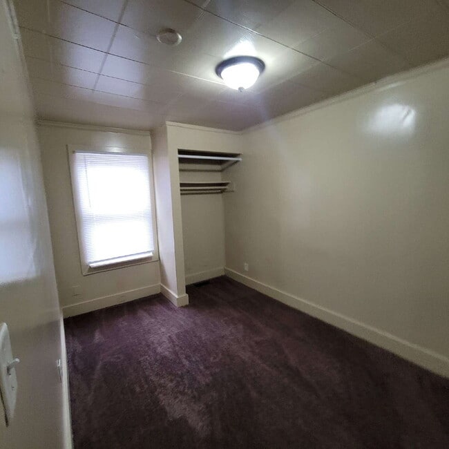 Building Photo - WEST SIDE HOUSE WITH 4 BEDROOMS, 2 BATHS, AND HUGE GARAGE/WORKSHOP COMBO