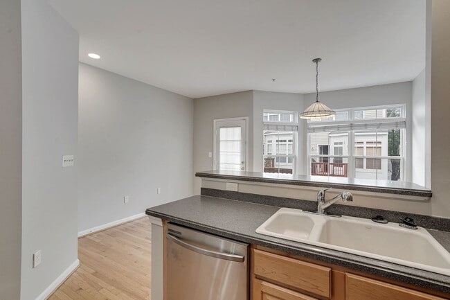 Building Photo - COMING SOON - Great 4 level end unit TH in...