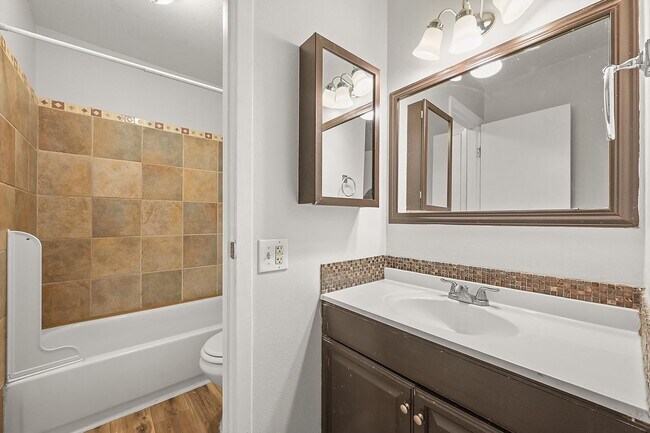 Building Photo - 3BR Townhome in Aurora | Private Yard, Covered Parking & Community Pool