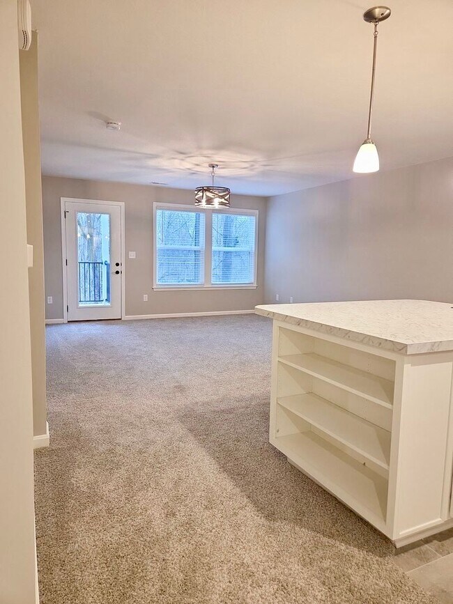 Building Photo - Exquisite brand new condo w/everything! Ground floor, no stairs, attached garage