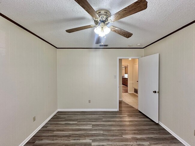 Building Photo - Spacious 4-Bedroom Home on a Corner Lot wi...