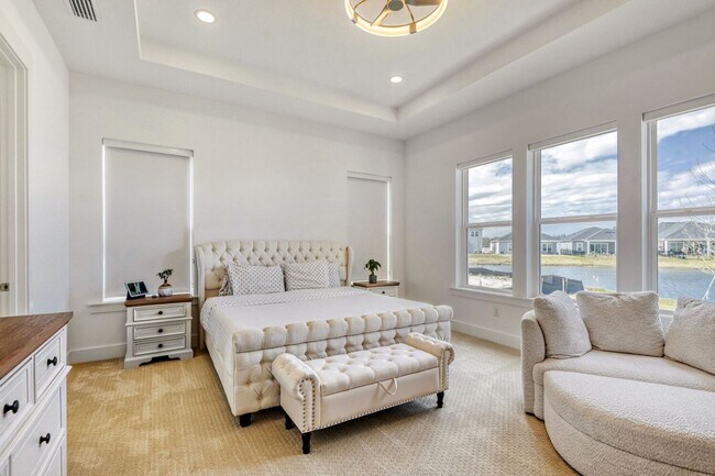 Building Photo - Resort-Style Furnished Lakefront Living in SilverLeaf | 100” Theater & Golf Cart Included