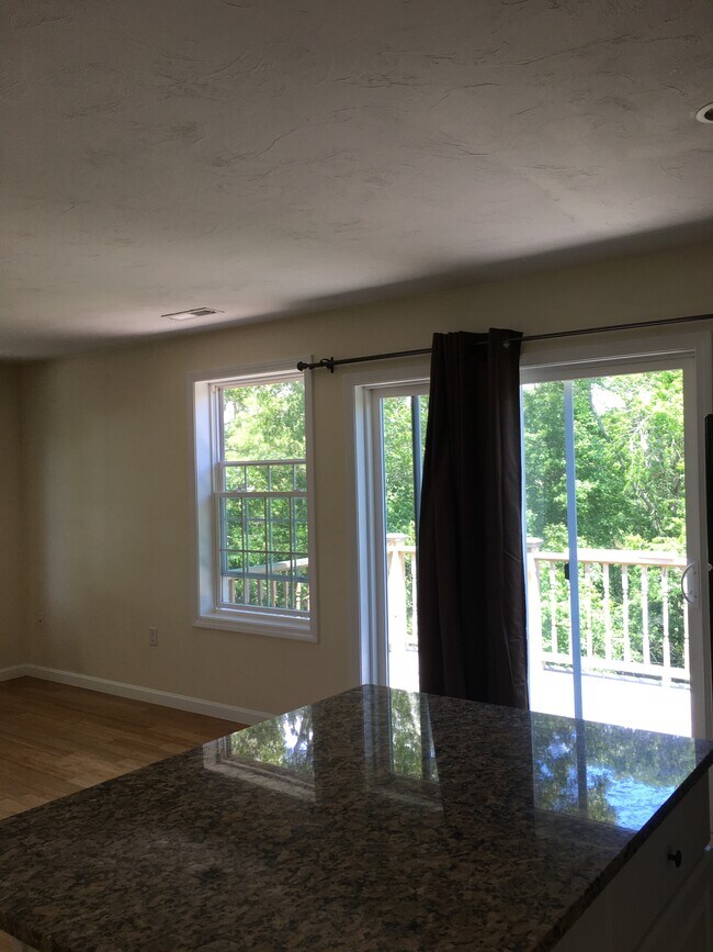 Slider to deck, off Living area and kitchen - 12 Cranberry Rd