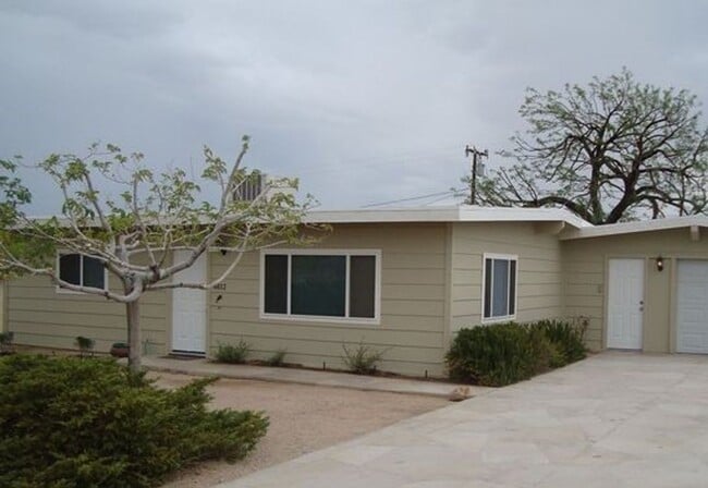 Building Photo - Darling Bungalow with New Flooring!