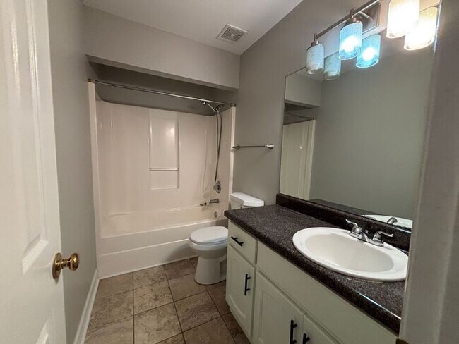 Building Photo - You will LOVE the fenced yard!