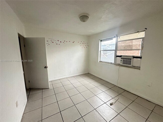 Building Photo - 6511 NW 12th Ave