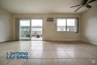 Building Photo - Spacious and Stylish 1-Bedroom with Balcon...