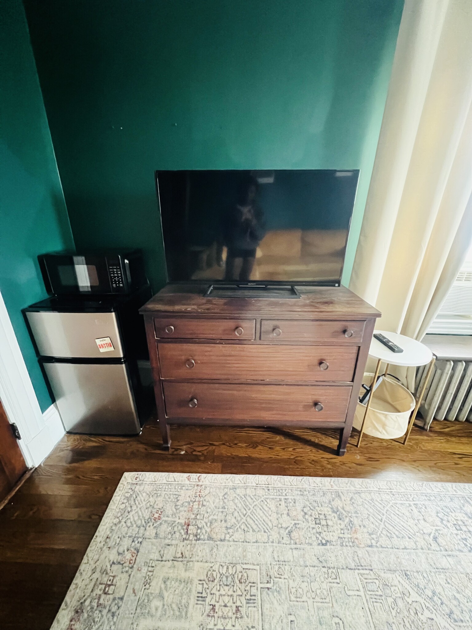 TV, mini fridge, microwave, AC unit, and dresser. - 22 Willard St