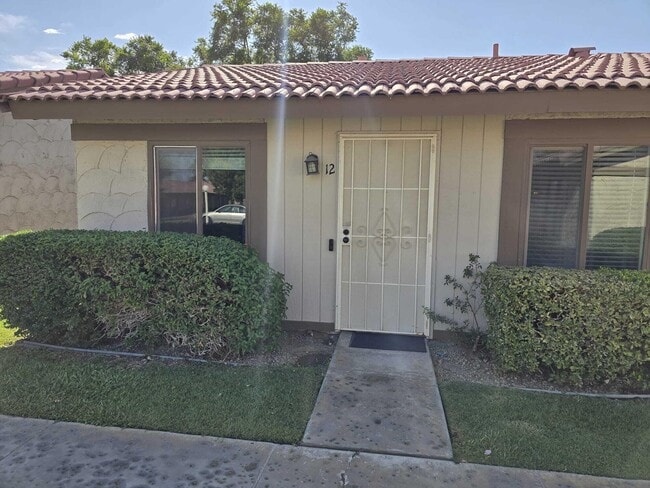 Building Photo - 82075 Country Club Dr