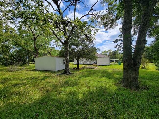 Building Photo - REMODELED 4 BEDROOM 2 BATH LEASE HOME IN A...