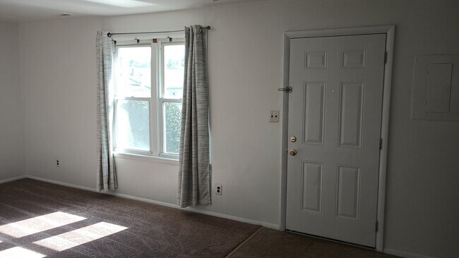 Living room whowing entry door - 1331 N Black Horse Pike