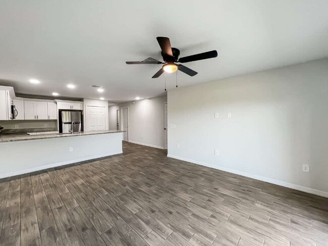 Building Photo - Move-In Special! Half Month FREE – APPLY by November 30th – Modern 3BR/2BA Duplex in Lehigh Acres...