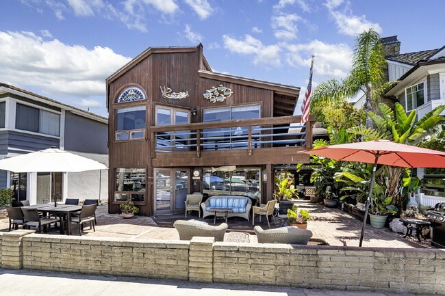 Primary Photo - Fully Furnished Island Life Waterfront Ret...