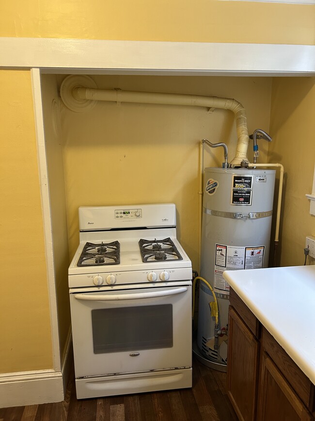 Modern range and water heater - 2315 Ward St