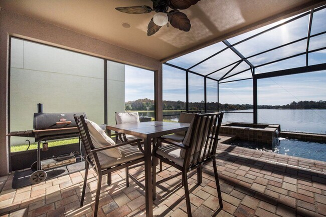 Building Photo - Large, Executive style 3/2.5 Lakefront/POOL Home in East Park of Lake Nona