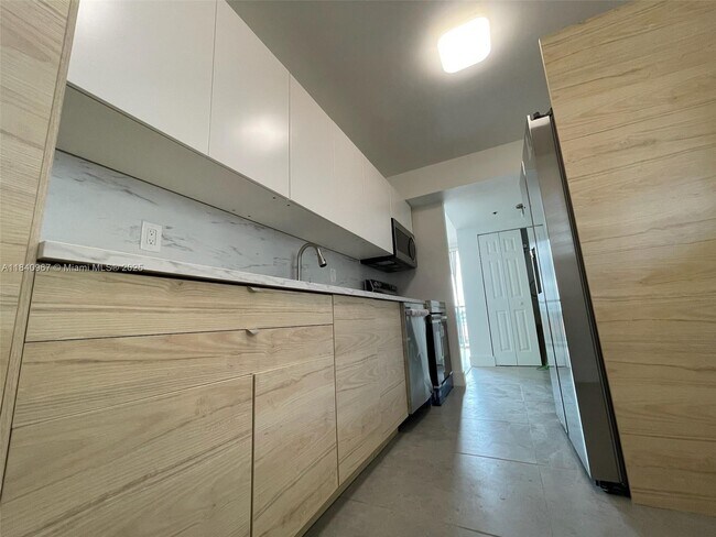 Building Photo - 8888 Collins Ave