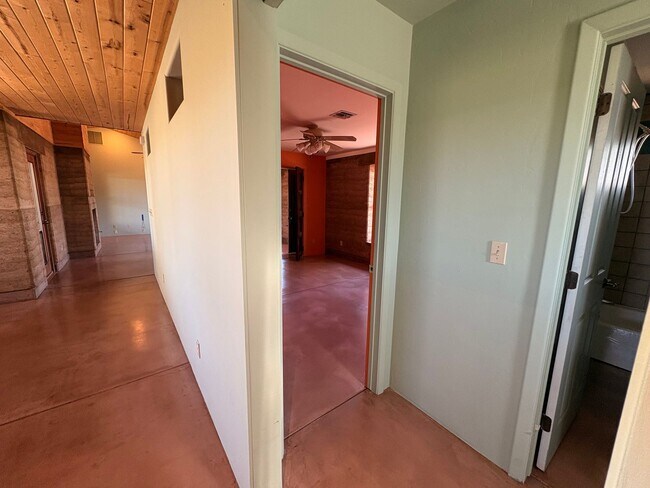 Building Photo - Desert Home on 3.3 Acres with Rooftop Views & Unique Rammed Earth Design