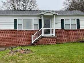 Building Photo - AFFORDABILITY!!