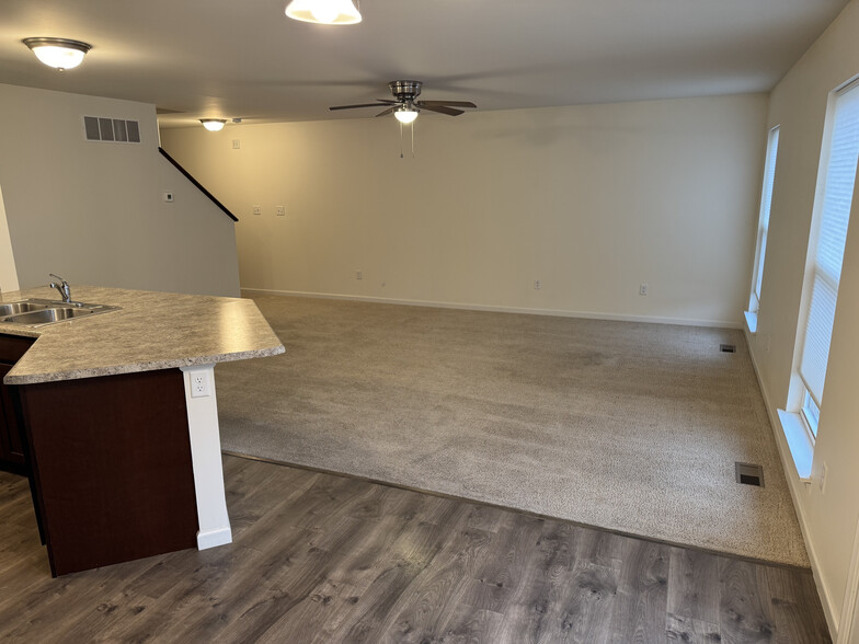 Living room from kitchen - 502 Peruque Commons Ct