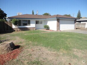 Building Photo - Clean 3 Bedroom 2 Bath Home